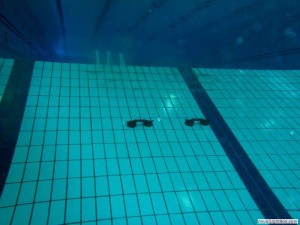 Tegelreparatie schuine wand duiklkuil Orka zwembadreparatie